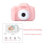 Çocuk Fotoğraf Makinesi - pembe mini dijital kamera önden görünüm ve kutu içeriği