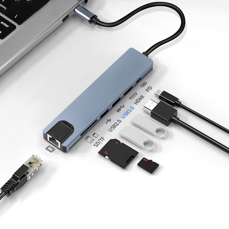 Type-C Çoğaltıcı - 8 in 1 hub laptopa bağlı; SD/TF, USB 2.0, USB 3.0, HDMI ve PD portları etiketli görünüm